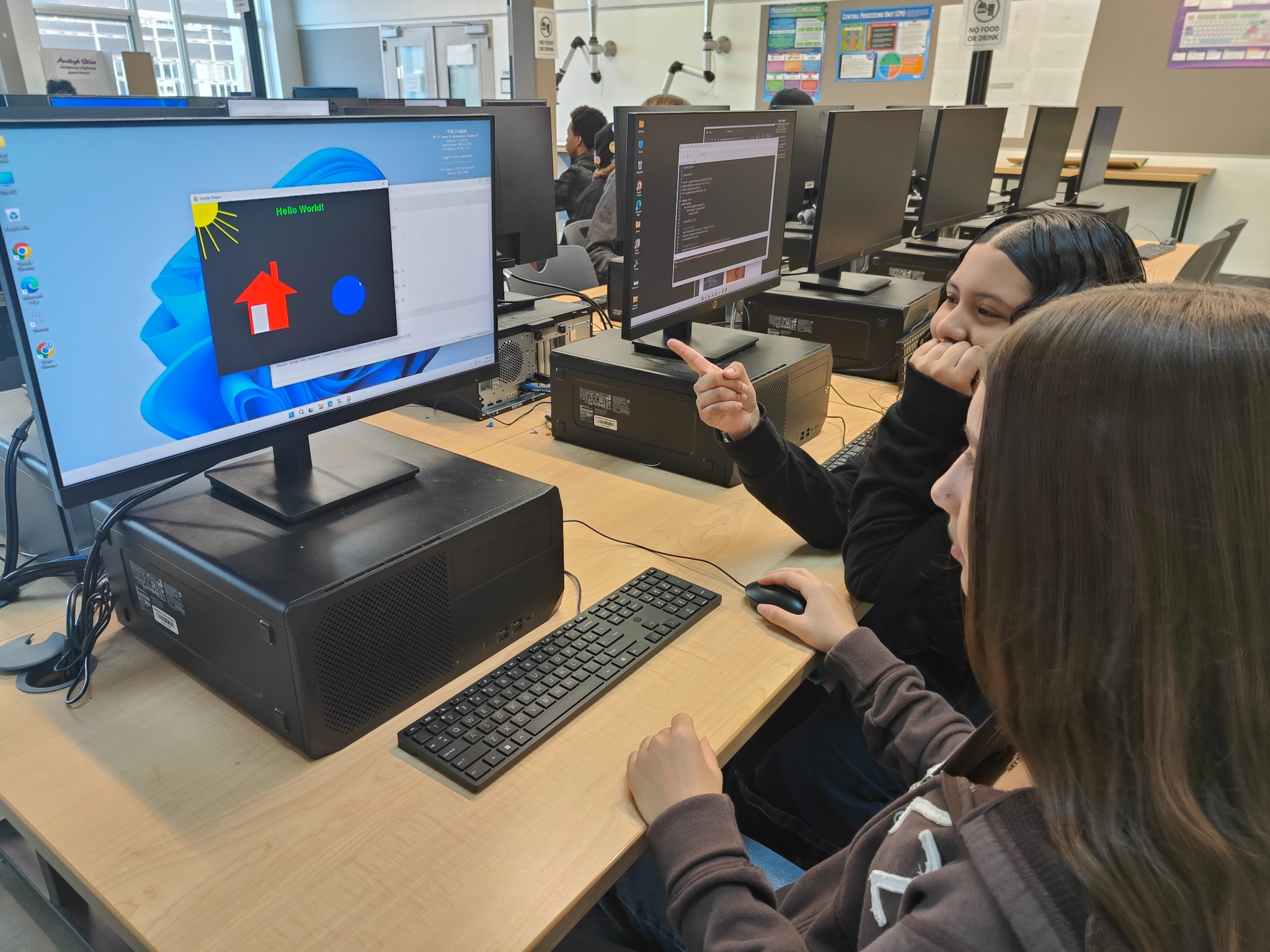 Students reviewing a project in Benson Computer Science